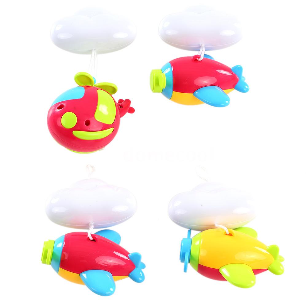 Carusel Patut Bebelusi Muzical cu Telecomanda NOVOKIDS Dream World, Cu Proiectie Tavan, Lumini Multicolore, Miscari Circulare Lente, Volum Reglabil, Avioane