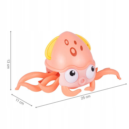 Caracatita interactiva Charming Octopus idealSTORE, Dimensiuni 25x11x13 Dotata cu Sfoara de tras Ajuta la dezvoltarea psiho-motorie a copilului, Culoare Roz