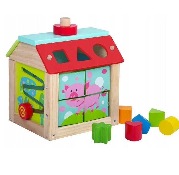 Casuta Educativa din lemn 5 in 1 idealSTORE, Beep Beep Pigy, Dimensiuni 20.5 x 18 x 16 cm, Echipata cu elemente mobile si butoane care dezvolta abilitatile manuale ale copilului, Puzzle-uri rotative si blocuri colorate