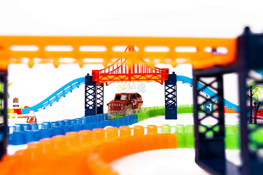 Set pista magica cu 3 masinute idealSTORE, Rainbow Amazing Tracks II, Include 360 de piese, Circuit complet luminat de LED-uri, Posibilitate de a combina elemente in orice ordine, Ideala pentru distractia copilului dumneavoastra