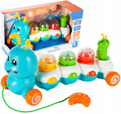 Jucarie Interactiva Muzicala pentru Bebelusi, Omida Vesela, Indiggo, cu Lumini si Melodii, Include 3 Bile Colorate, Snur de Tras de 30 cm, Incurajeaza Invatarea Mersului, Distractiva si Educativa, 18luni+, Multicolor