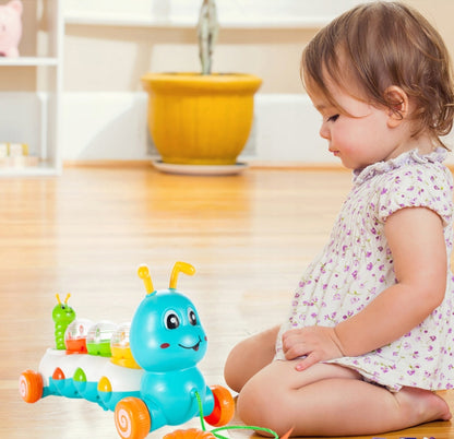 Jucarie Interactiva Muzicala pentru Bebelusi, Omida Vesela, Indiggo, cu Lumini si Melodii, Include 3 Bile Colorate, Snur de Tras de 30 cm, Incurajeaza Invatarea Mersului, Distractiva si Educativa, 18luni+, Multicolor