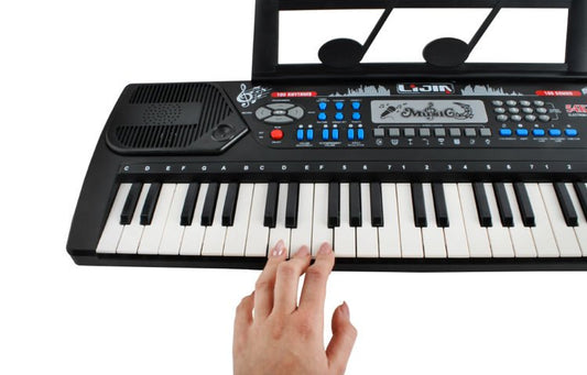 Orga electronica cu Microfon idealSTORE Maggic Music Sing, Dimensiuni 70.5 x 23 x 22 cm, Echipata cu 54 Taste, Suport muzica incorporat, Sleep Mode economiseste bateria, 10 piese Stereo, 3 Efecte sonore, Control volum, Negru