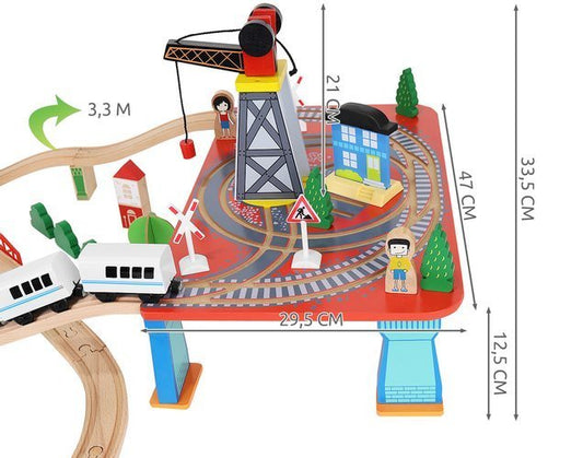 Tren Electric din Lemn Woody Train idealStore, 88 Elemente, Pista, Tren de Marfa si Pasageri, Masinuta, Copaci, Indicatoare Rutiere, Caine Politist, Figurine Persoane, Macara, Elemente Conectate prin Magneti