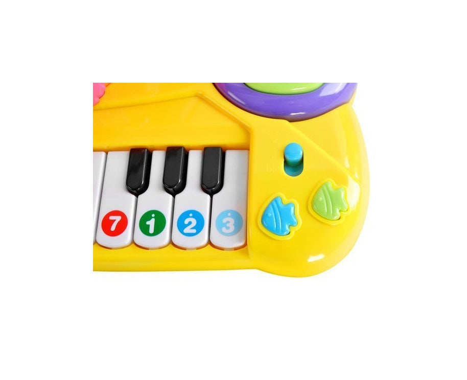 Pian interactiv 2 in 1 idealSTORE BABY ELEPHANT, Dimensiuni 35 x 20 x 11 cm, Echipat cu 14 melodii, Tobe, Stimuleaza imaginatia, Incurajeaza distractia si ajuta la invatarea vesela a cifrelor