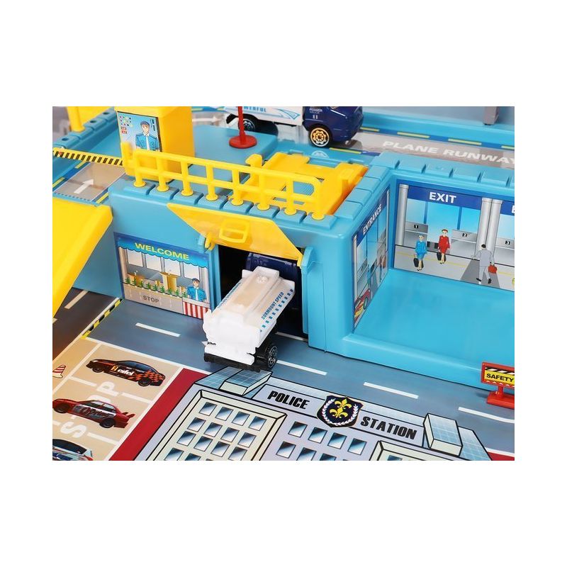 Aeroport pentru copii HEAVEAN AIRPORT idealSTORE, Dimensiuni 95 x 60 x 28,5 cm, Este format din 70 elemente, Include accesorii, avion, 4 camioane, indicatoare, autocolante, pista de aterizare