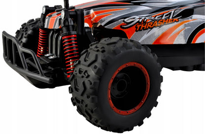 Masinuta cu Telecomanda si Suspensii OFFROAD Racing SPORT, Dimensiune 35 x 22 x 14 cm, Scara 1:16, Reglarea directiei rotilor, 4 amortizoare si un motor puternic permit depasirea pantei pana la 45, Viteza maxima 30 km/h, Negru-Portocaliu