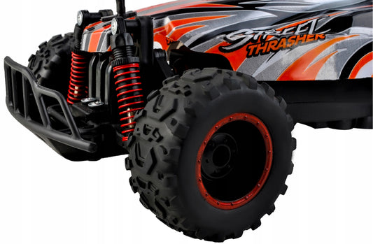 Masinuta cu Telecomanda si Suspensii OFFROAD Racing SPORT, Dimensiune 35 x 22 x 14 cm, Scara 1:16, Reglarea directiei rotilor, 4 amortizoare si un motor puternic permit depasirea pantei pana la 45, Viteza maxima 30 km/h, Negru-Portocaliu