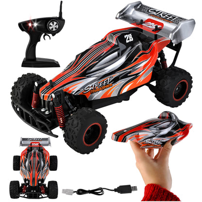 Masinuta cu Telecomanda si Suspensii OFFROAD Racing SPORT, Dimensiune 35 x 22 x 14 cm, Scara 1:16, Reglarea directiei rotilor, 4 amortizoare si un motor puternic permit depasirea pantei pana la 45, Viteza maxima 30 km/h, Negru-Portocaliu