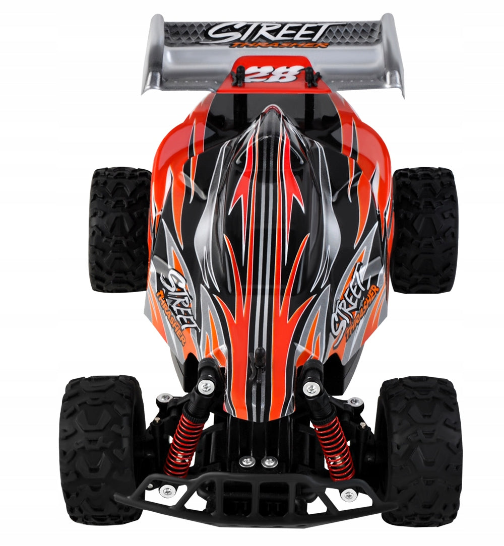 Masinuta cu Telecomanda si Suspensii OFFROAD Racing SPORT, Dimensiune 35 x 22 x 14 cm, Scara 1:16, Reglarea directiei rotilor, 4 amortizoare si un motor puternic permit depasirea pantei pana la 45, Viteza maxima 30 km/h, Negru-Portocaliu