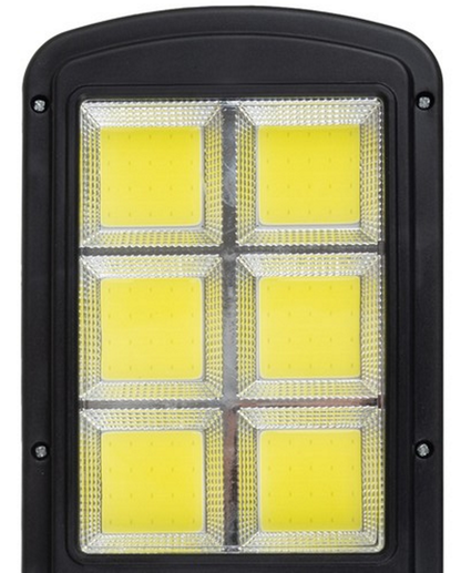 Lampa Solara Stradala idealSTORE, Include 120 LED COB, Senzor de Miscare, Panou Solar Incorporat, 4 Moduri de Operare, Putere 36 W, Unghi de Iluminat 120 , IP 67, Brat de Montare si Telecomanda, Timp de Functionare 8-10 Ore, Reglaj Vertical-Orizontal