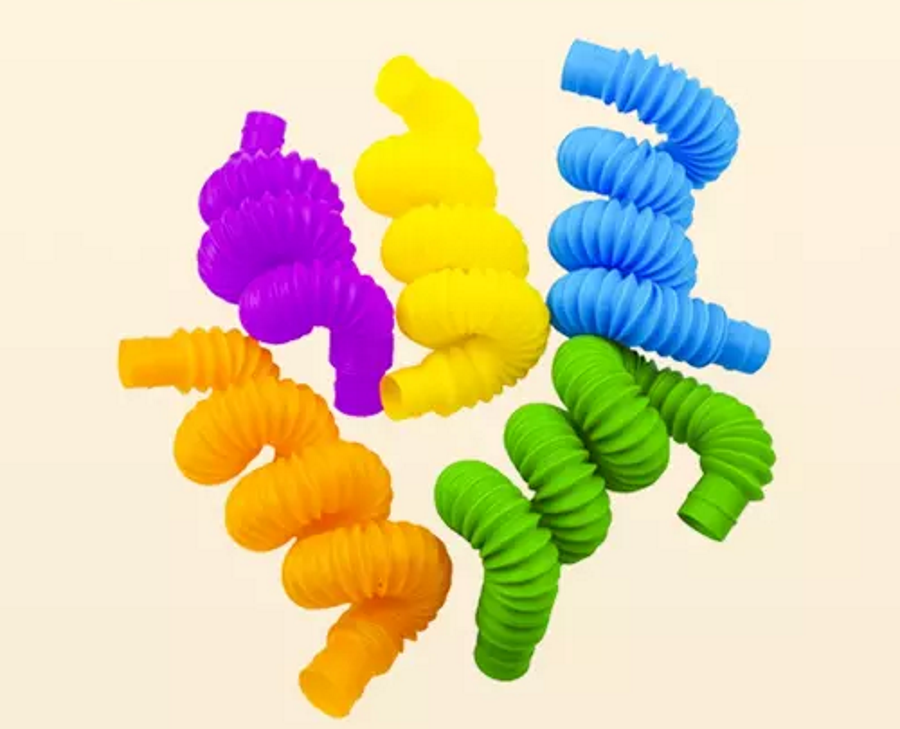 Set 20 de Tuburi Sensoriale Colorate idealSTORE, Dimensiuni 16 x 51 cm, Antistres, Alcatuit din 7 culori, galben, roz, violet, portocaliu, albastru, bleumarin, verde, Material Plastic, Stimulare Tactila si Auditiva