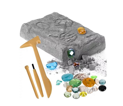 Set Arheologic idealSTORE de Sapaturi pentru Copii, Dimensiuni 16,5 x 12 x 3,2 cm, Include Roca de gips, Dalta, Ciocan, Perie de curatat, Pietre, Diamante, Dezvolta imaginatia si Precizia