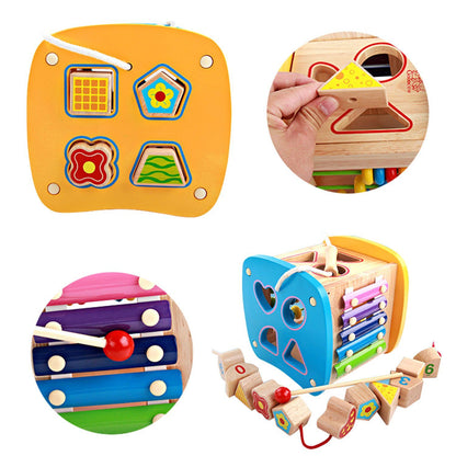 Cub Educativ din Lemn IDL, Junior Mix, Accesorizat cu diverse elemente interactive ce incurajeaza Dezvoltarea abilitatilor motorii si manuale, Ajuta la coordonarea mana-ochi si stimuleaza imaginatia copilului, Design calitativ si fara muchii ascutite