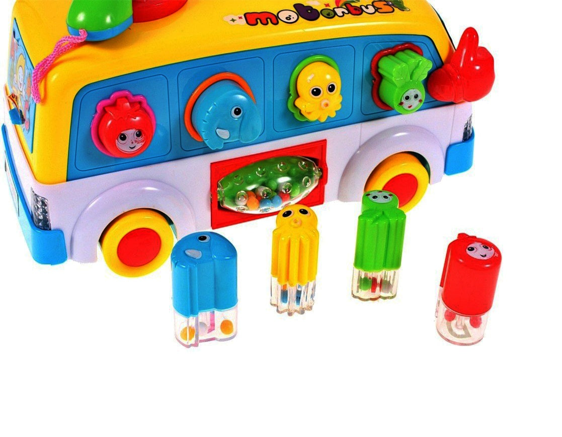 Jucarie interactiva IDL Junior Party Bus, Varietate de sunete si lumini, Diverse accesorii elementare care ajuta la dezvoltarea coordonarii mana-ochi si atrag atentia prin varietatea de culori si forme, Functionalitate pe baterii