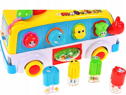 Jucarie interactiva IDL Junior Party Bus, Varietate de sunete si lumini, Diverse accesorii elementare care ajuta la dezvoltarea coordonarii mana-ochi si atrag atentia prin varietatea de culori si forme, Functionalitate pe baterii