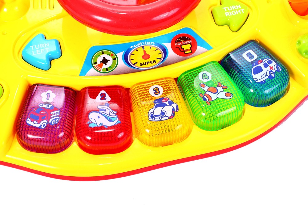 Volan interactiv idealSTORE, Dimensiuni 31.0 x 18.0 x 8.0 cm, Accesorizat cu Diverse Functii, Echipat cu butoane specifice unei masini, Culori vi care atrag atentia