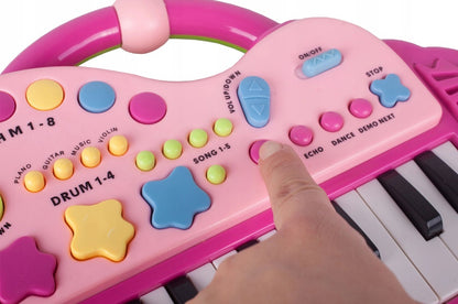 Orga Electronica Interactiva idealStore Let's Sing Pentru Copii, Portabila, Maner Confortabil, 29 Taste, 2 Difuzoare Incorporate, 8 Moduri Ritmice, 5 Melodii Preincarcate, Buton de Control al Volumului, Buton de Pornire/Oprire Roz
