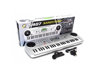 Orga muzicala cu Microfon IDL Maggie World, Echipata cu 54 de clape, Boxe stereo si un Ecran LCD, O multime de functii multimedia, Posibilitatea de a conecta casti sau boxe externe, Un instrument pentru copii interesati de lumea muzicii