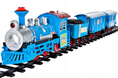 Centru de activitati si puzzle Trenuletul Micul Calator, Versiune moderna cu 3 vagoane detasabile, Acompaniat de sunete pentru o distractie garantata, Functionalitate pe baterii, Culoare albastru-gri