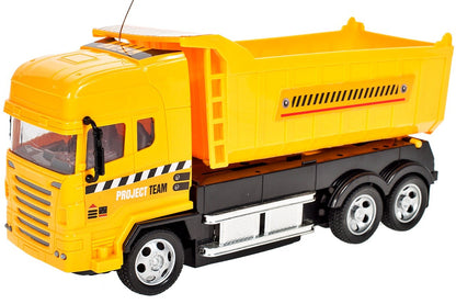 Camion interactiv idealSTORE, DIMENSIUNI 25 x 8 x 12 cm, Control la distanta pentru 4 canale, Autobasculanta mobila, Prag reglabil al rotilor din fata, O incantare pentru orice copil pasionat de masini