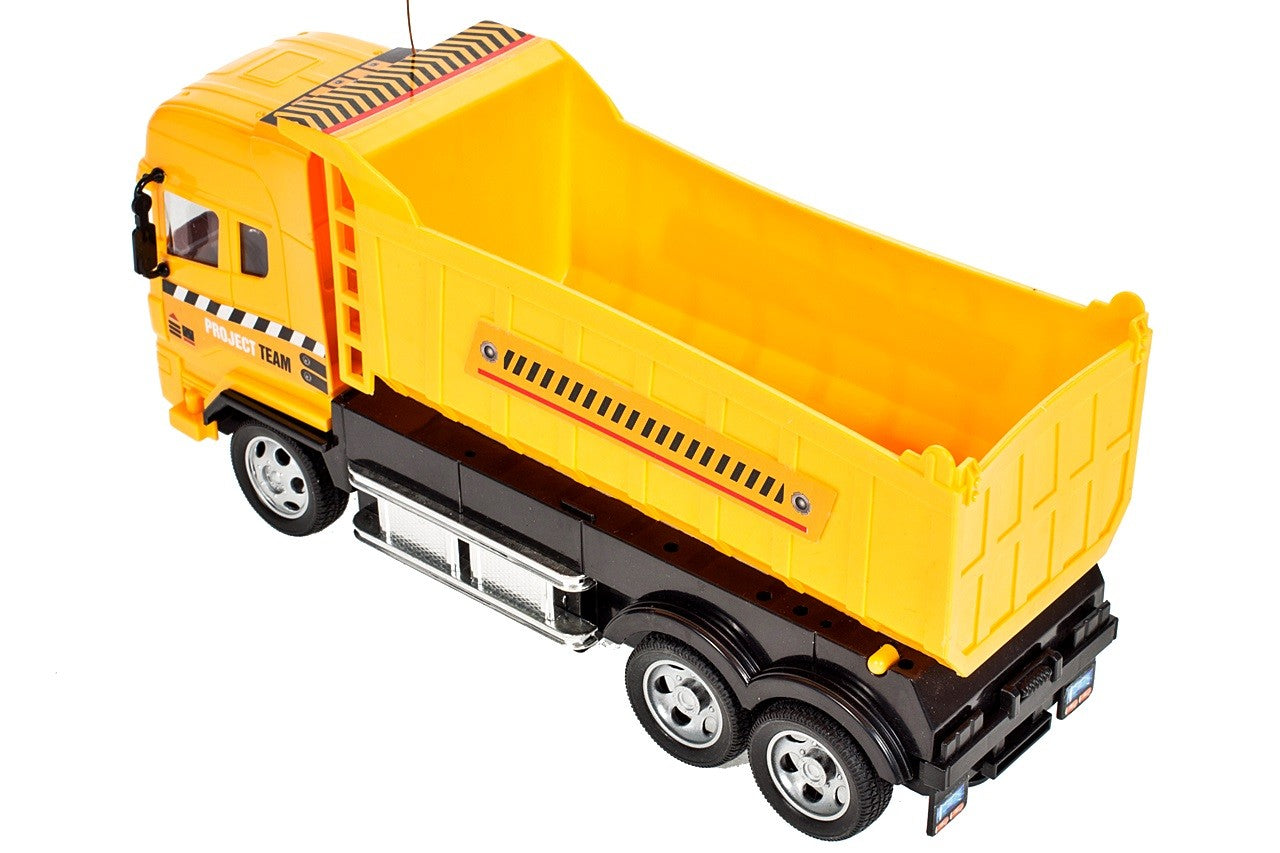 Camion interactiv idealSTORE, DIMENSIUNI 25 x 8 x 12 cm, Control la distanta pentru 4 canale, Autobasculanta mobila, Prag reglabil al rotilor din fata, O incantare pentru orice copil pasionat de masini