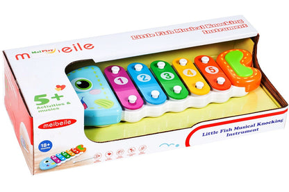 Xilofon Muzical Piranha Fish, 24 cm lungime, Permite dezvoltarea abilitatilor muzicale ce creaza o aventura a sunetelor, Instrument muzical in forma de pestisor ce stimuleaza coordonarea motorie si auditiva implicand multe simturi, Culoare-Multicolor