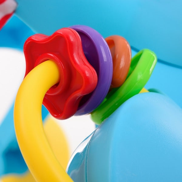 Premergator interactiv IDL Elefantelul Jucaus ce ajuta la invatarea primilor pasi, dezvolta abilitatile manuale, coordoneaza miscarea, dezvolta simturile, Cu sunete si lumini, Alcatuit din elemente simbolice, Culoare-Albastru