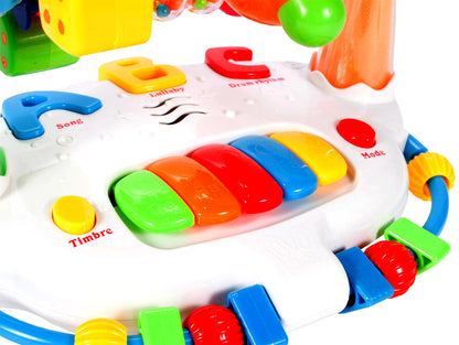 Jucarie interactiva cu pian idealSTORE Happy BELL, Dimensiuni 24 x 18 x 17 cm, Accesorizat cu o multitudine de functii, efecte sonore si piese in miscare, Sporeste imaginatia si imbunatateste relatia cauza-efect