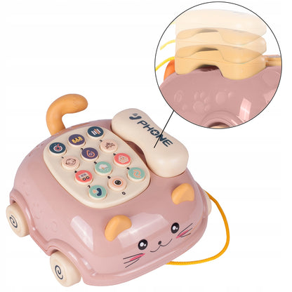 Telefon Interactiv Stil Pisicuta Happy Cat idealStore, Dimensiuni 12.5 x 14 x 6.5 cm, Cantece de Leagan, Diverse Melodii si Sunete Interactive, Urechi Stralucitoare, Culori Vii Atragatoare, Roz