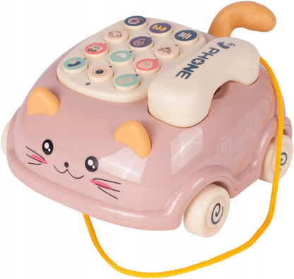 Telefon Interactiv Stil Pisicuta Happy Cat idealStore, Dimensiuni 12.5 x 14 x 6.5 cm, Cantece de Leagan, Diverse Melodii si Sunete Interactive, Urechi Stralucitoare, Culori Vii Atragatoare, Roz