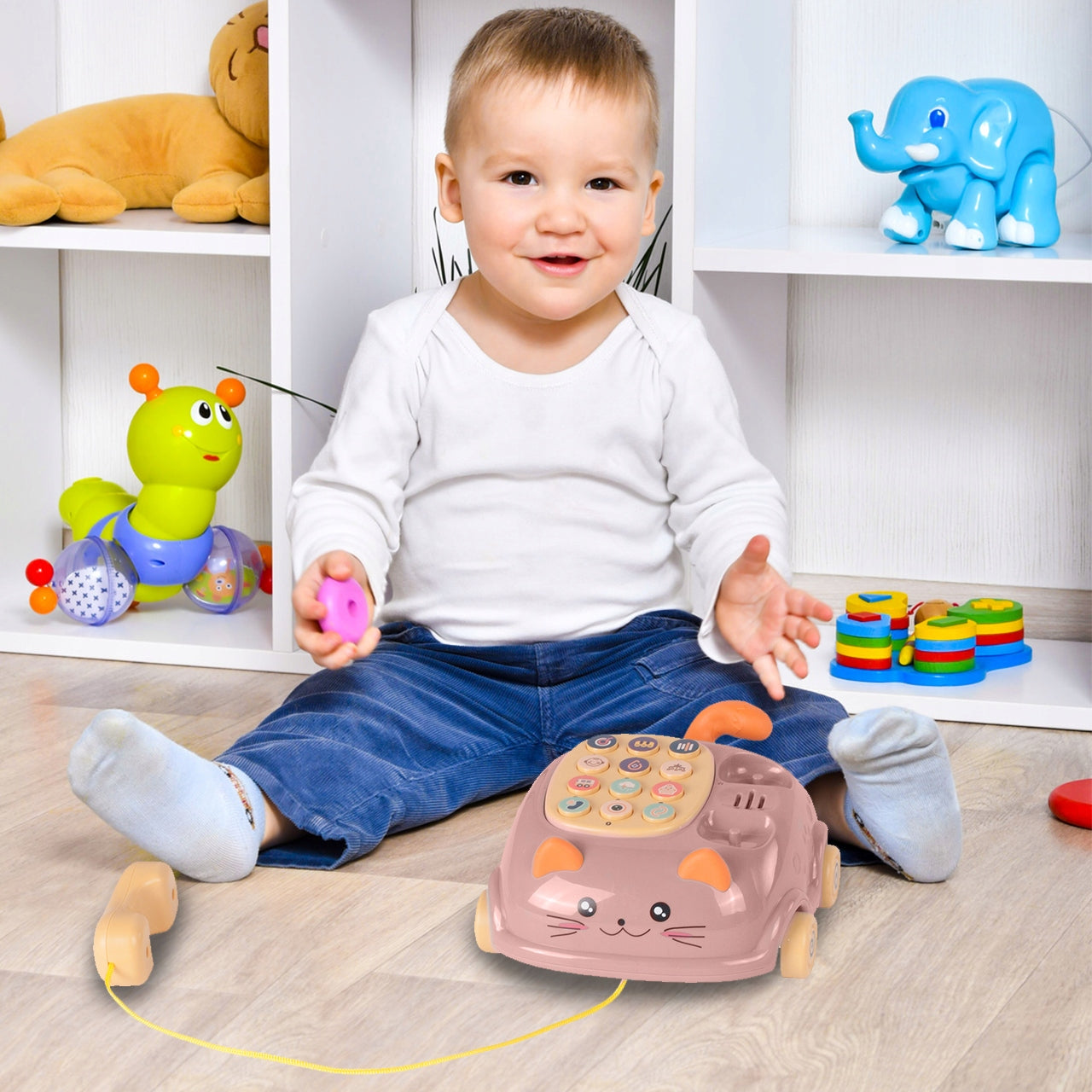 Telefon Interactiv Stil Pisicuta Happy Cat idealStore, Dimensiuni 12.5 x 14 x 6.5 cm, Cantece de Leagan, Diverse Melodii si Sunete Interactive, Urechi Stralucitoare, Culori Vii Atragatoare, Roz