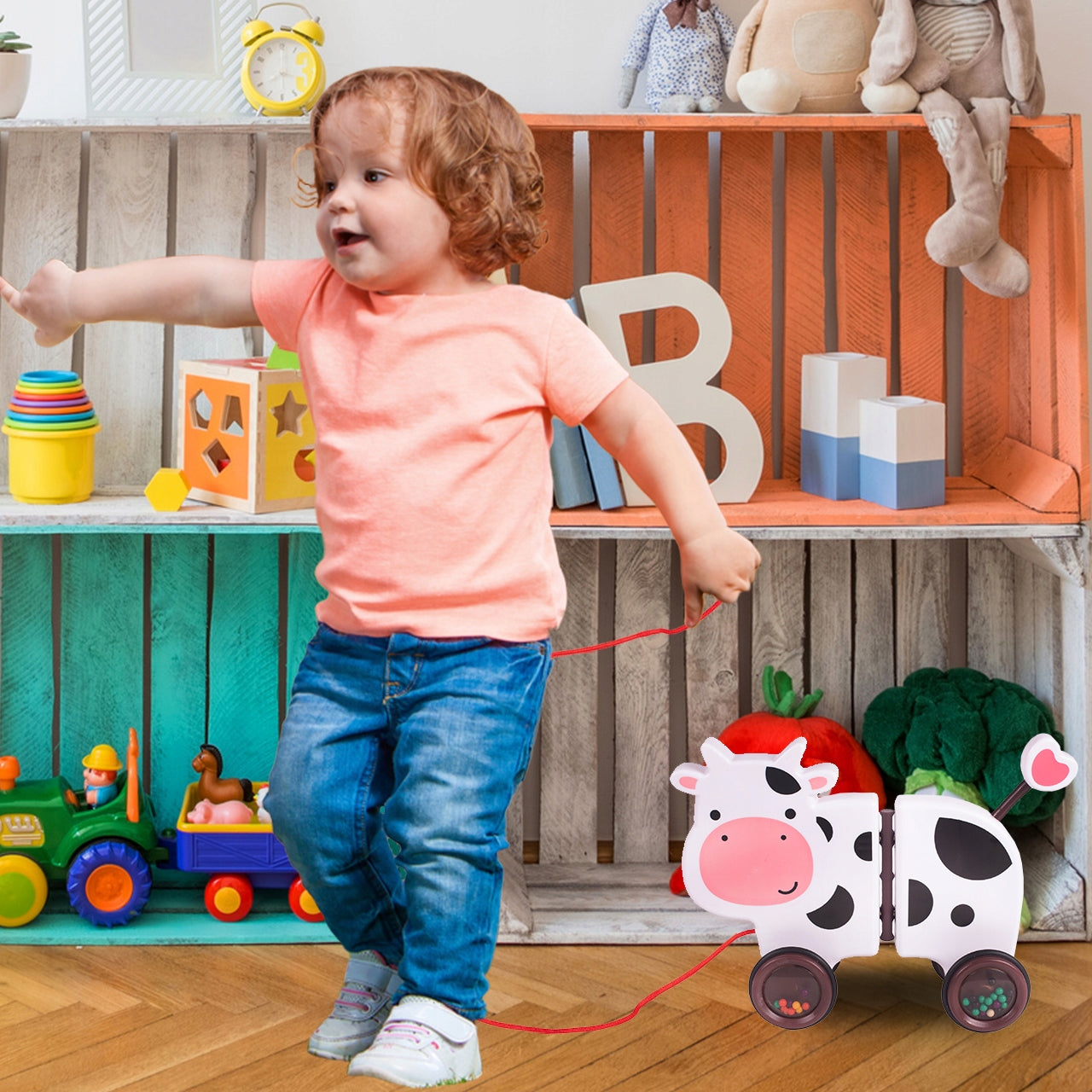 Jucarie interactiva Tip Vacuta Happy Cow idealSTORE, Dimensiune 18 x 19 x 9 cm, Dotata cu Sfoara Fabricat din plastic de inalta calitate, Roti inconjurate cu cauciuc, Pline cu bile, Posibilitatea de a se separa in 2 parti