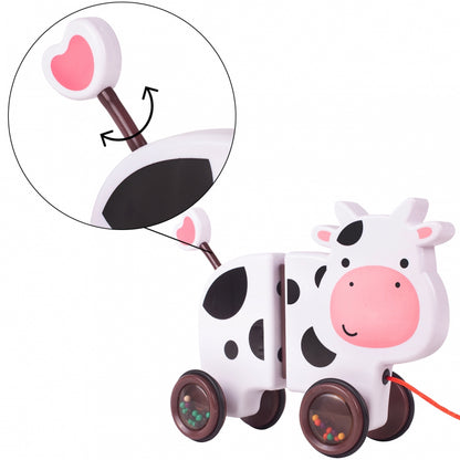 Jucarie interactiva Tip Vacuta Happy Cow idealSTORE, Dimensiune 18 x 19 x 9 cm, Dotata cu Sfoara Fabricat din plastic de inalta calitate, Roti inconjurate cu cauciuc, Pline cu bile, Posibilitatea de a se separa in 2 parti