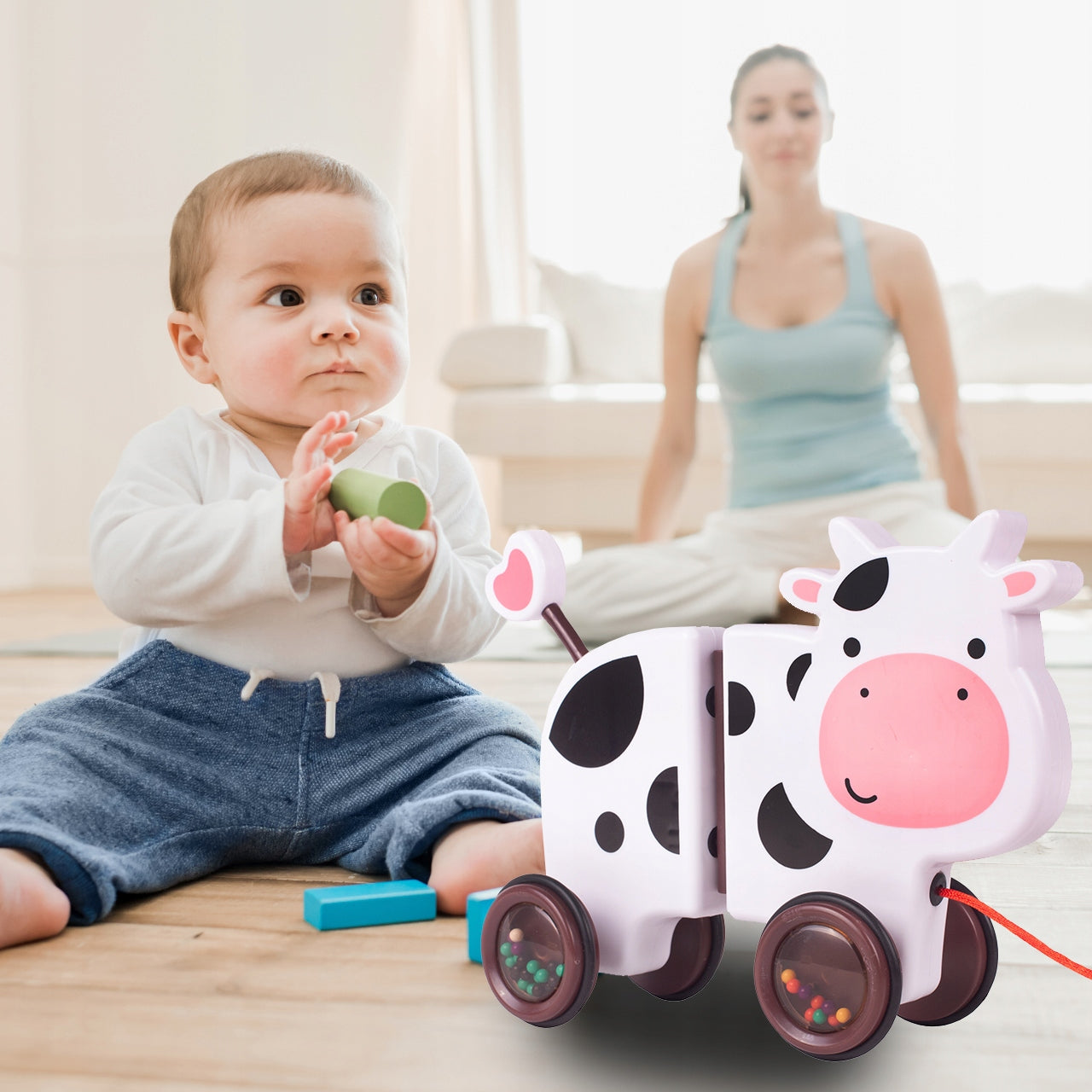 Jucarie interactiva Tip Vacuta Happy Cow idealSTORE, Dimensiune 18 x 19 x 9 cm, Dotata cu Sfoara Fabricat din plastic de inalta calitate, Roti inconjurate cu cauciuc, Pline cu bile, Posibilitatea de a se separa in 2 parti