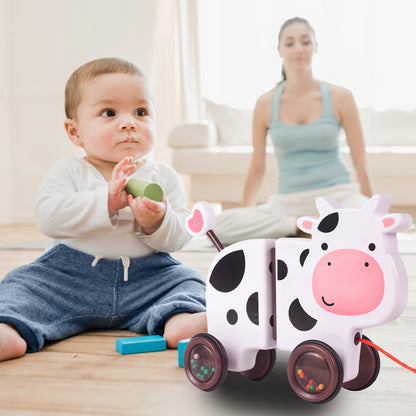 Jucarie interactiva Tip Vacuta Happy Cow idealSTORE, Dimensiune 18 x 19 x 9 cm, Dotata cu Sfoara Fabricat din plastic de inalta calitate, Roti inconjurate cu cauciuc, Pline cu bile, Posibilitatea de a se separa in 2 parti