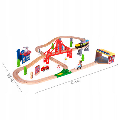 Pista Multifunctionala Merry Train idealSTORE din Lemn Natural, Construita din 70 de piese, Locomotiva + 2 vagoane cu magnet, Elicopter cu elice, Heliport, Detasament de Pompieri, Politie, Copaci, Indicatoare rutiere, Oameni, Piese Slefuite fin din lemn