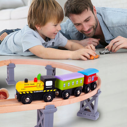 Pista Multifunctionala Merry Train idealSTORE din Lemn Natural, Construita din 70 de piese, Locomotiva + 2 vagoane cu magnet, Elicopter cu elice, Heliport, Detasament de Pompieri, Politie, Copaci, Indicatoare rutiere, Oameni, Piese Slefuite fin din lemn