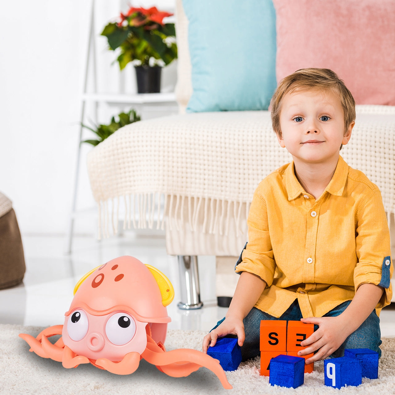 Caracatita interactiva Charming Octopus idealSTORE, Dimensiuni 25x11x13 Dotata cu Sfoara de tras Ajuta la dezvoltarea psiho-motorie a copilului, Culoare Roz