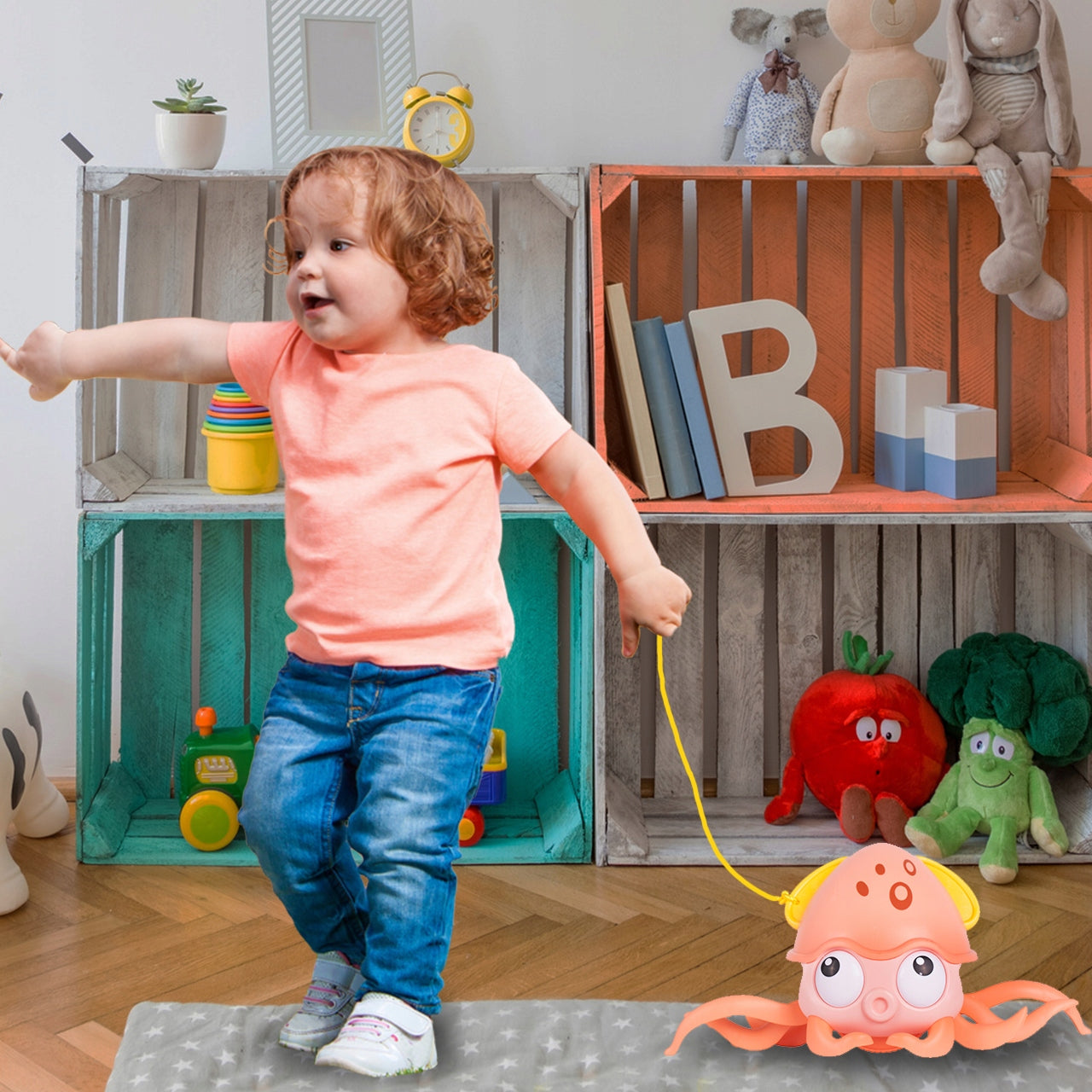 Caracatita interactiva Charming Octopus idealSTORE, Dimensiuni 25x11x13 Dotata cu Sfoara de tras Ajuta la dezvoltarea psiho-motorie a copilului, Culoare Roz