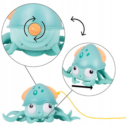 Caracatita interactiva Charming Octopus idealSTORE, Dimensiuni 25 x 11 x 13 Dotata cu Sfoara de tras, Ajuta la dezvoltarea psiho-motorie a copilului, Perfecta pentru o baie linistita