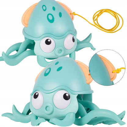 Caracatita interactiva Charming Octopus idealSTORE, Dimensiuni 25 x 11 x 13 Dotata cu Sfoara de tras, Ajuta la dezvoltarea psiho-motorie a copilului, Perfecta pentru o baie linistita