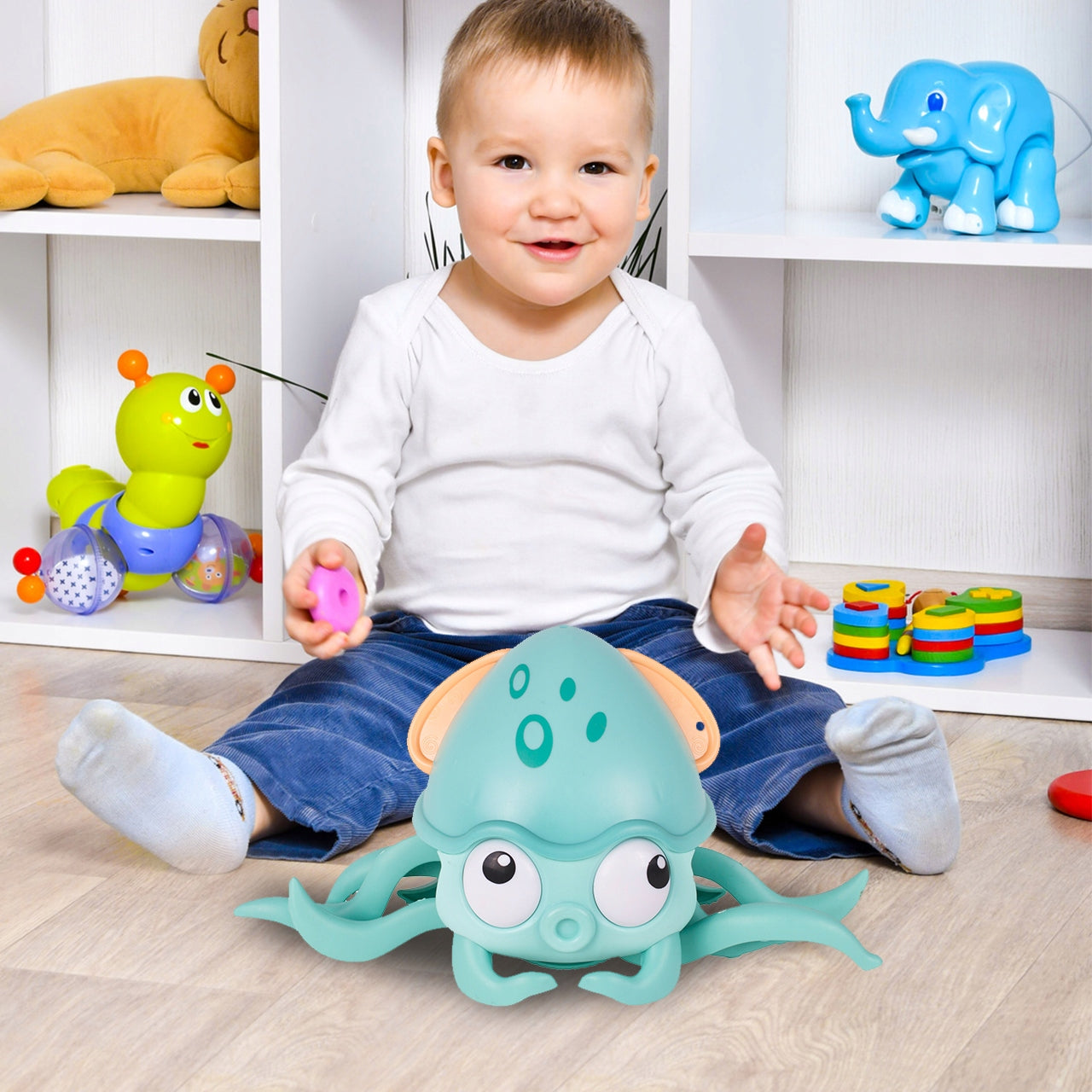 Caracatita interactiva Charming Octopus idealSTORE, Dimensiuni 25 x 11 x 13 Dotata cu Sfoara de tras, Ajuta la dezvoltarea psiho-motorie a copilului, Perfecta pentru o baie linistita