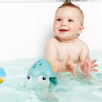 Caracatita interactiva Charming Octopus idealSTORE, Dimensiuni 25 x 11 x 13 Dotata cu Sfoara de tras, Ajuta la dezvoltarea psiho-motorie a copilului, Perfecta pentru o baie linistita