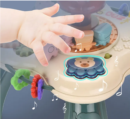 Masuta Educativa pentru Bebelusi 2in1 Happy Zoo idealSTORE, Include un Trenulet cu Vagoane, Animale Rotative, Volan, Panou Interactiv Detasabil, Accesorizat cu Efecte luminoase si Sonore, Elemente Mobile, Comutator ON/OFF