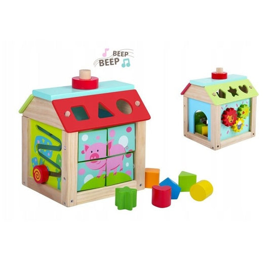 Casuta Educativa din lemn 5 in 1 idealSTORE, Beep Beep Pigy, Dimensiuni 20.5 x 18 x 16 cm, Echipata cu elemente mobile si butoane care dezvolta abilitatile manuale ale copilului, Puzzle-uri rotative si blocuri colorate