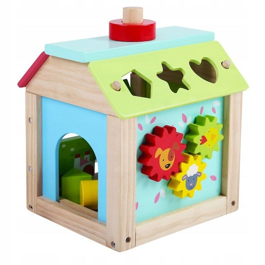 Casuta Educativa din lemn 5 in 1 idealSTORE, Beep Beep Pigy, Dimensiuni 20.5 x 18 x 16 cm, Echipata cu elemente mobile si butoane care dezvolta abilitatile manuale ale copilului, Puzzle-uri rotative si blocuri colorate