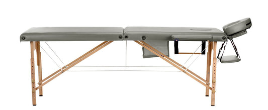 Masa de masaj pliabila idealSTORE, 2 segmente, Inaltime reglabila 62-84 cm, Piele ecologica moale, 2 cotiere laterale, Structura din lemn, Sarcina 250 KG, Rezistenta la uleiuri si apa, Include geanta de transport, Culoare Gri