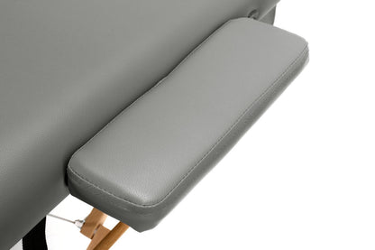 Masa de masaj pliabila idealSTORE, 2 segmente, Inaltime reglabila 62-84 cm, Piele ecologica moale, 2 cotiere laterale, Structura din lemn, Sarcina 250 KG, Rezistenta la uleiuri si apa, Include geanta de transport, Culoare Gri