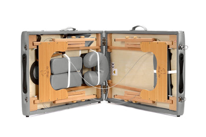 Masa de masaj pliabila idealSTORE, 2 segmente, Inaltime reglabila 62-84 cm, Piele ecologica moale, 2 cotiere laterale, Structura din lemn, Sarcina 250 KG, Rezistenta la uleiuri si apa, Include geanta de transport, Culoare Gri